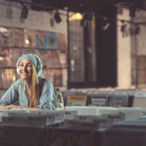 Smiling woman in a vinyl store